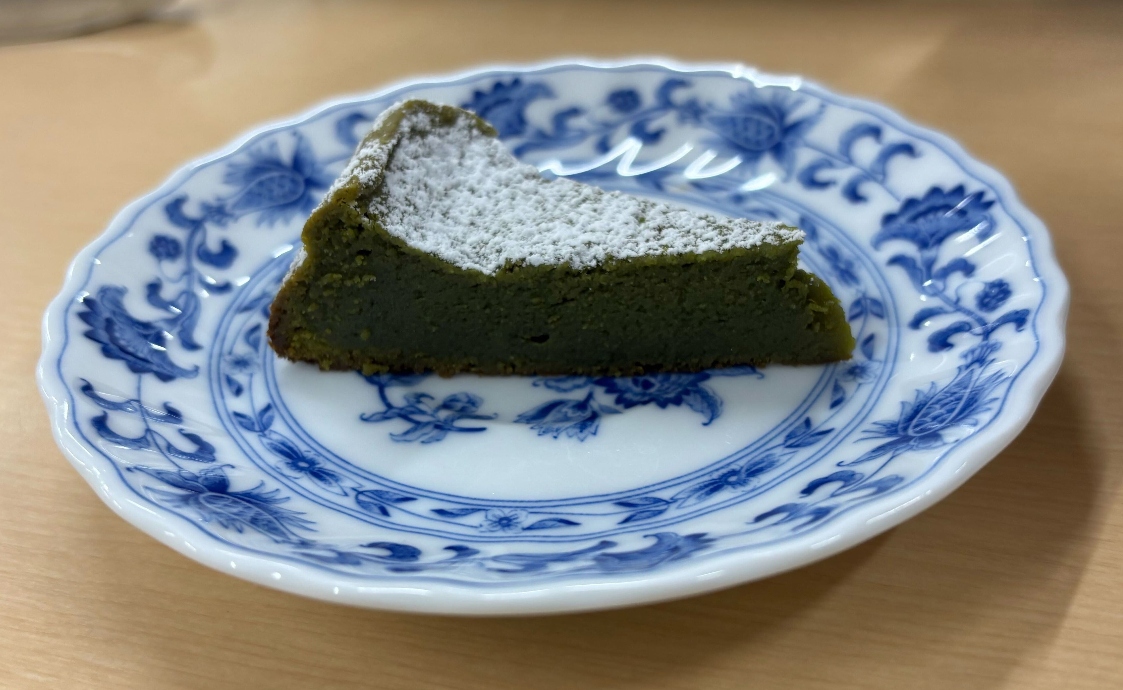 a piece of matcha chocolate cake